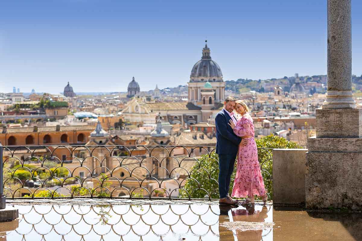 Couple taking photos at Parco del Pincio in Rome Italy