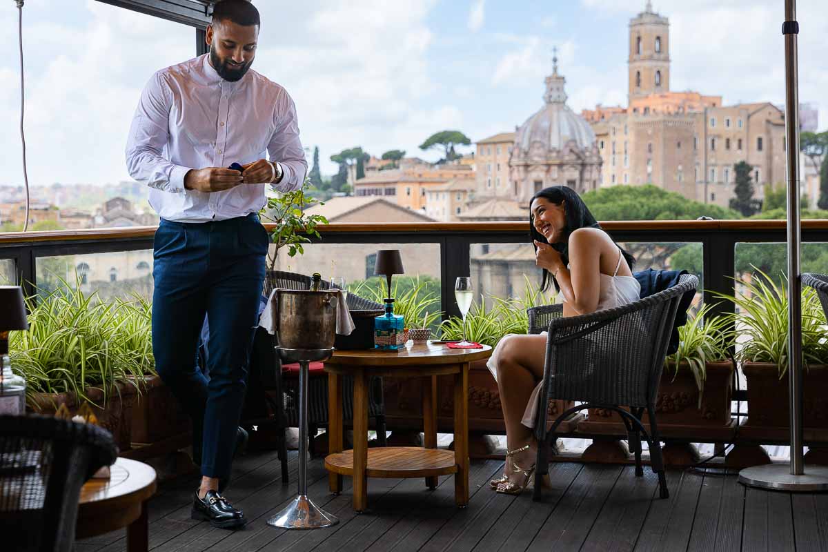 Just about to propose on a terrace with a unique view over the older part of Rome