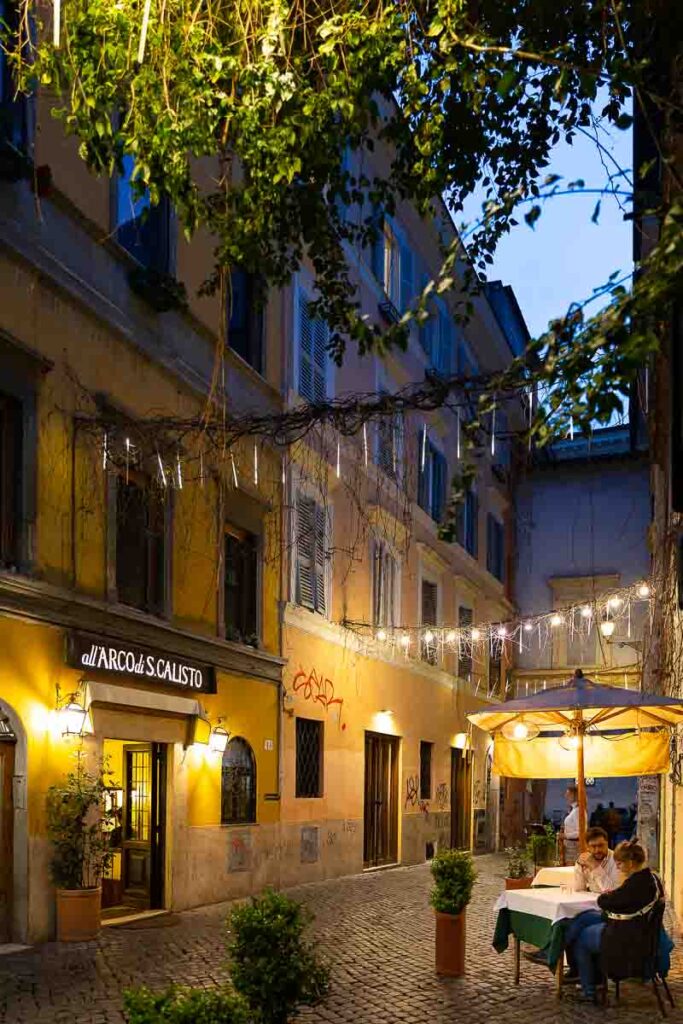 Couple sitting on an outside restaurant enjoying an aperitif before asking the big question