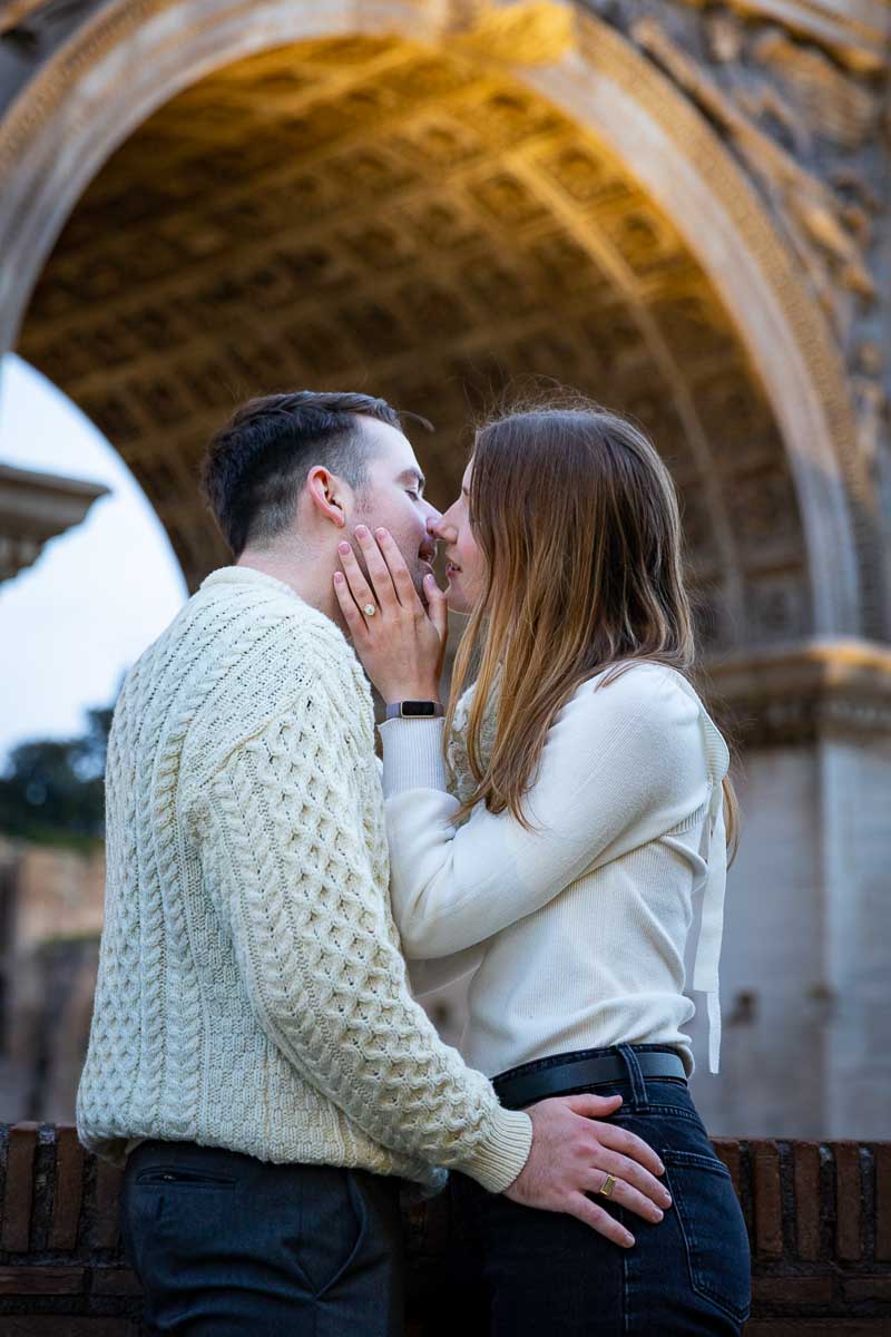Couple kissing during and engagement photo shoot in Rome Italy