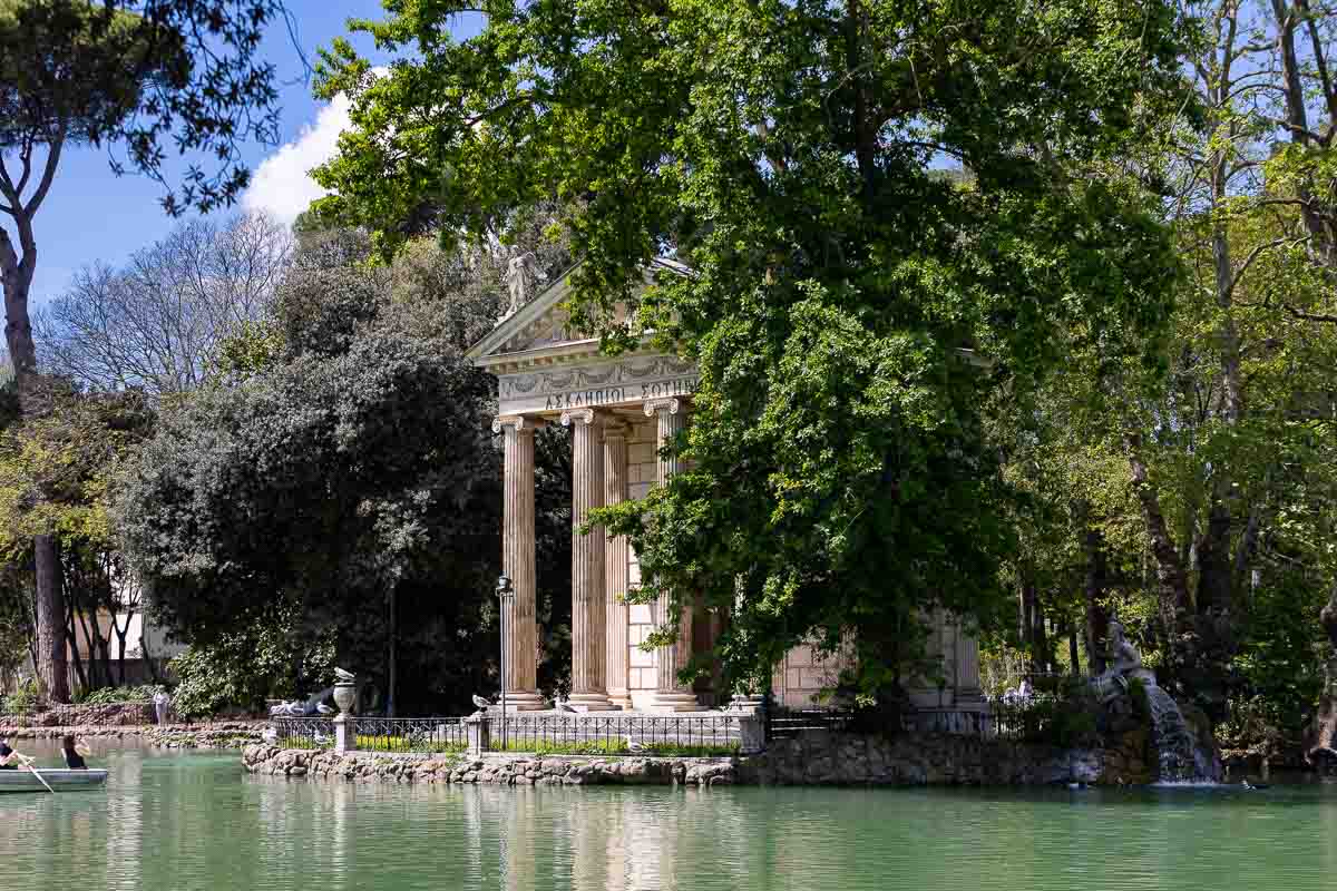 The Temple of Asclepius photographed on the Villa Borghese lake in Rome