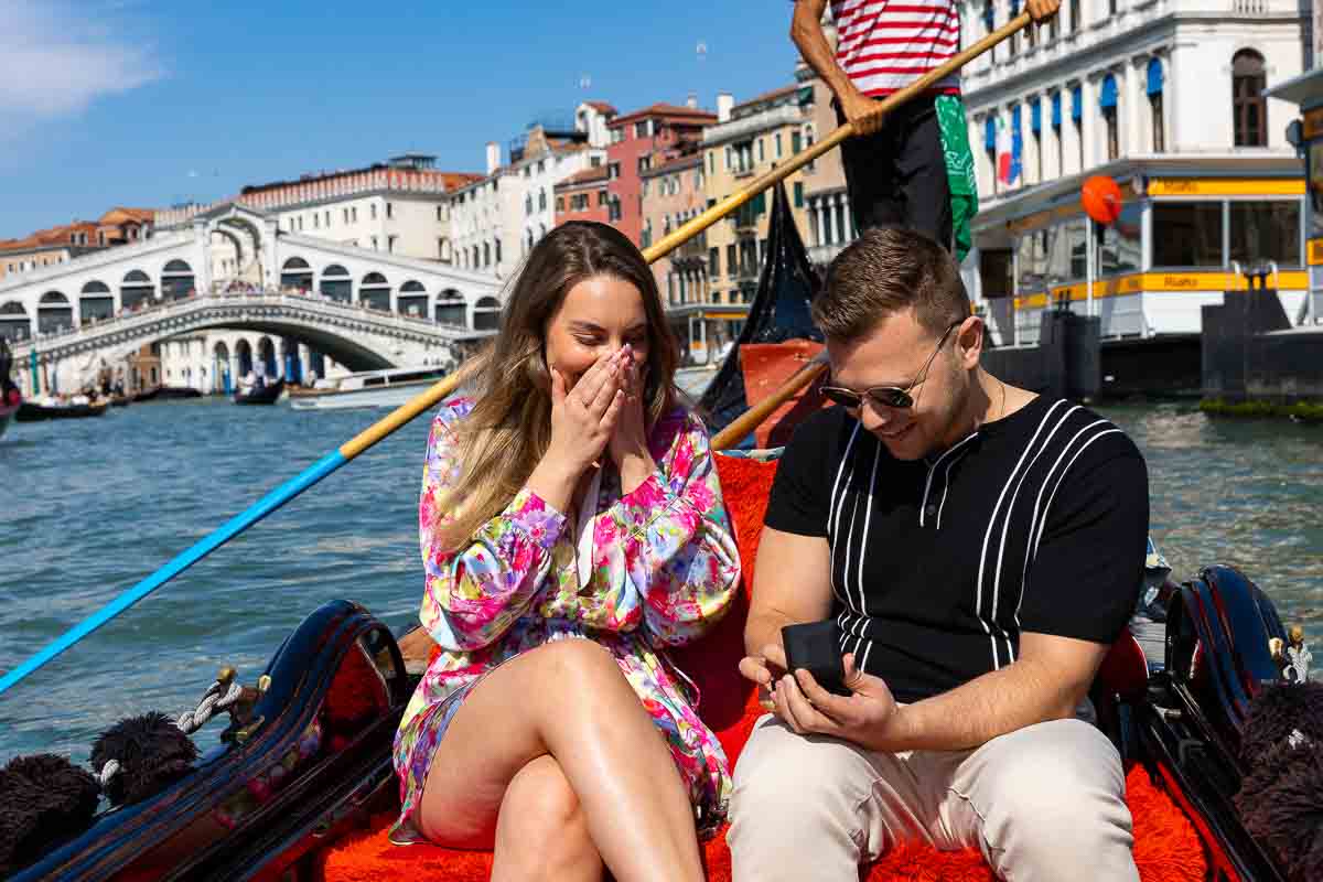 The surprise mixed in with joy during the proposal moment on a gondola in the city of Venice Italy