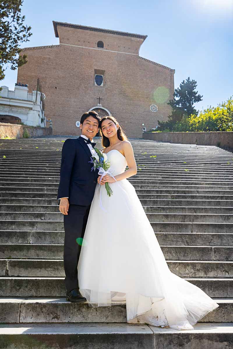 Standing at the bottom of the Ara Coeli Staircase while taking wedding photos in the morning 