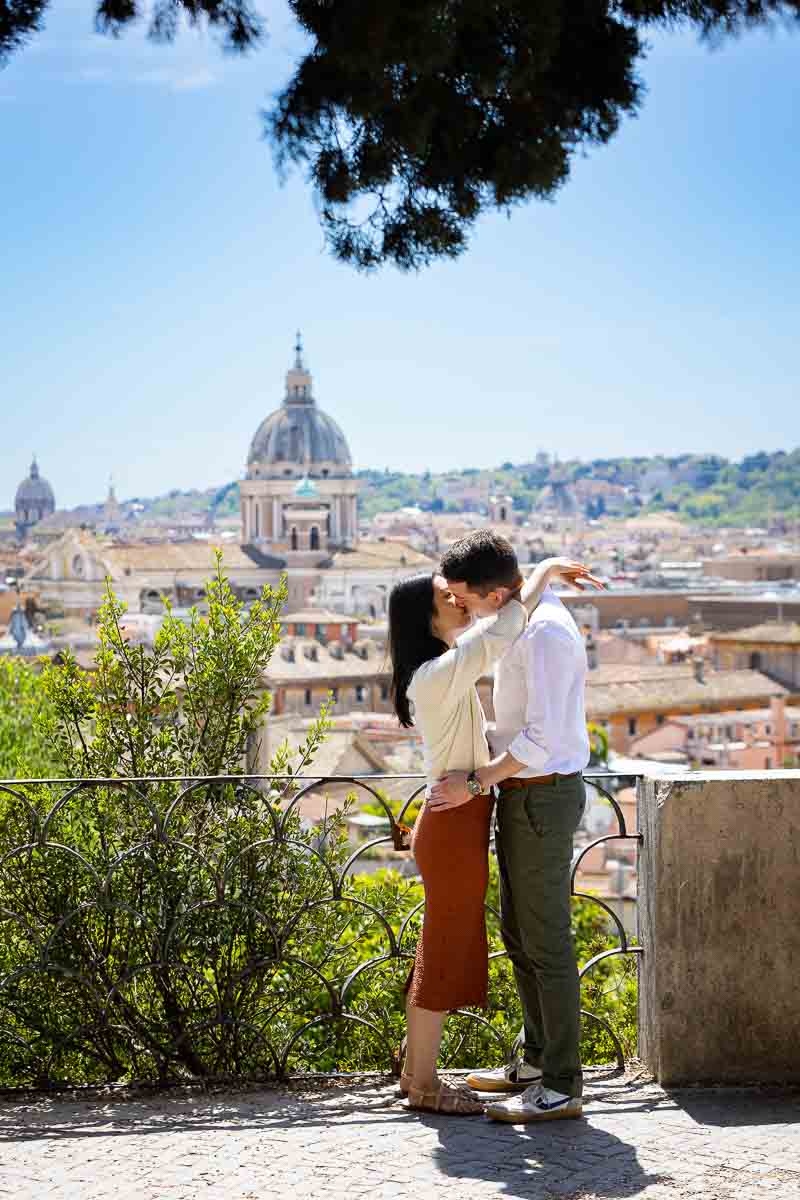 Pincio park terrace outlook photography session of a couple kissing 