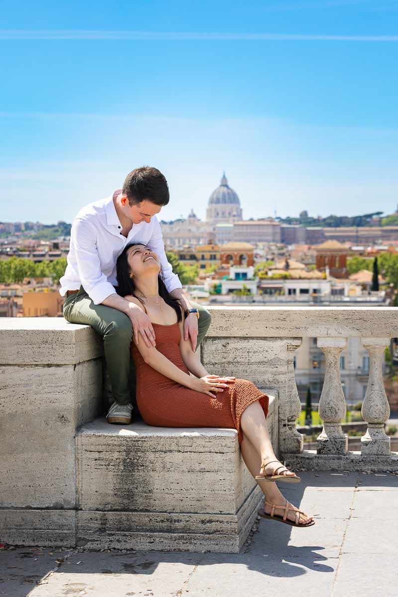 Looking at each other on the pincio park terrace panoramic outlook while being the subject of photography 