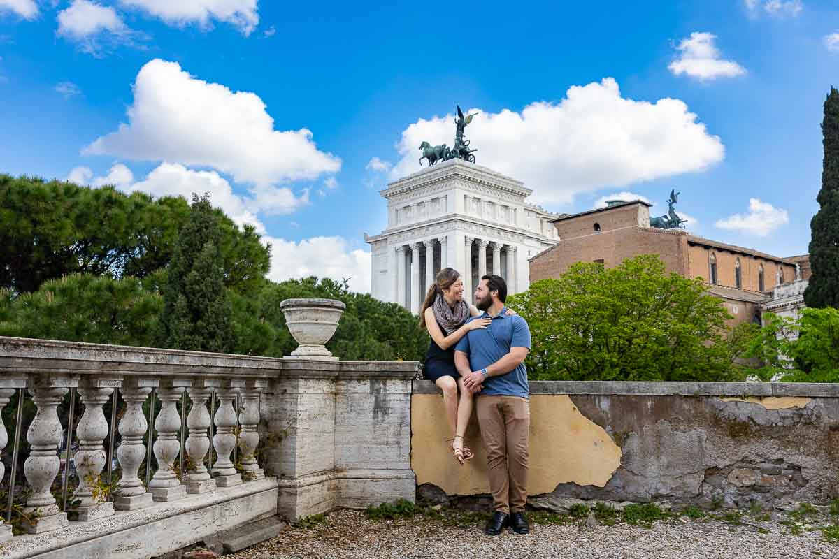 Sitting down in front of the Vittoriano monument found in the city of Rome 