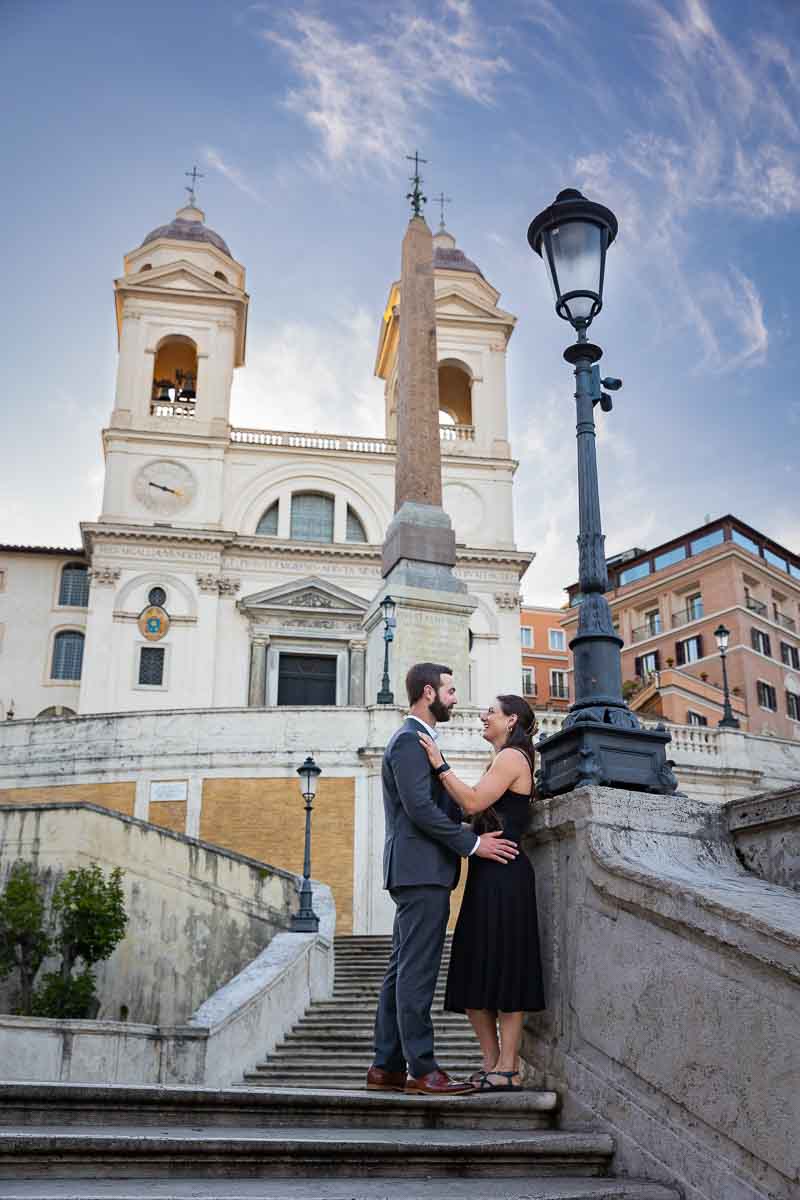 Posed couple on the Spanish steps in Rome Italy