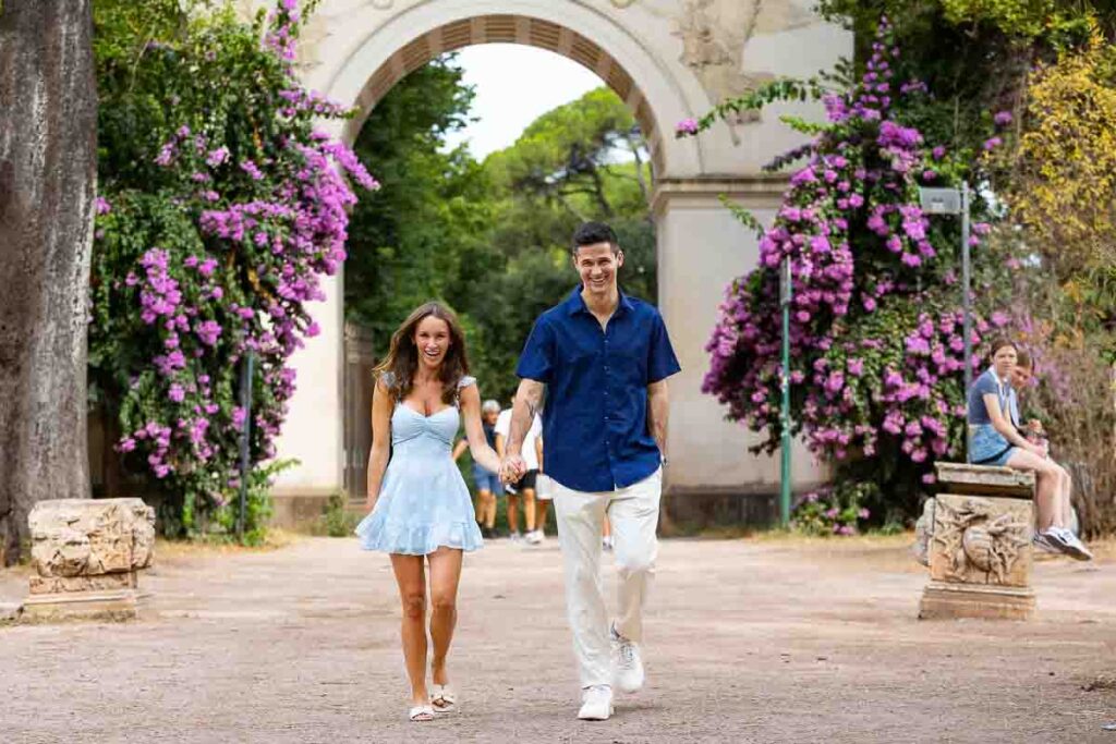 Walking in the park in Rome Italy during an engagement photoshoot