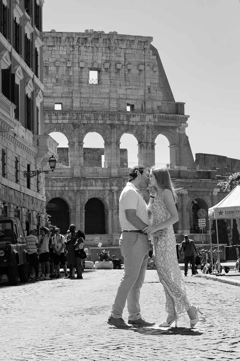 Colosseum image of a couple kissing in black and white 