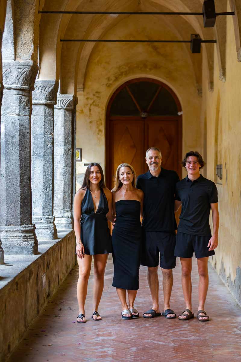 Family picture taken in San Francesco cloister in Sorrento Italy 