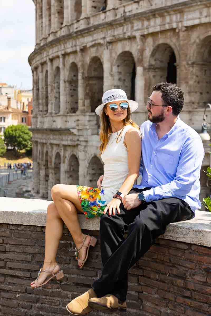 Sitting down on a ledge while taking pictures in Rome Italy