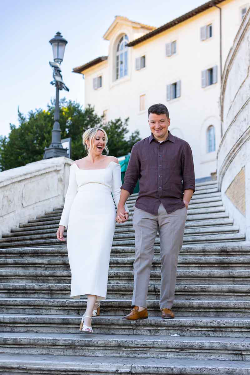 Walking down the Spanish steps holding hands 