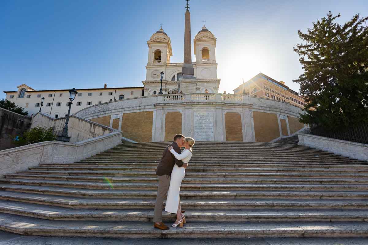 Rome couple pictures taken on the Spanish steps in the early morning with no one around