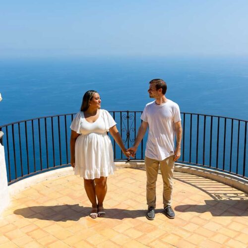 Holding hands on the Infinity terrace in Ravello overlooking the Amalfi coast from above