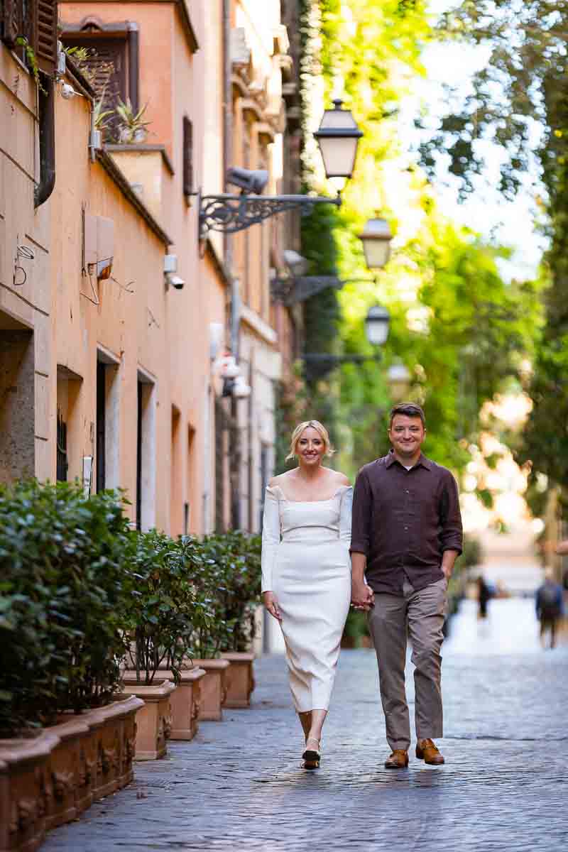 Walking in the streets of Rome Italy during a couple photoshoot 
