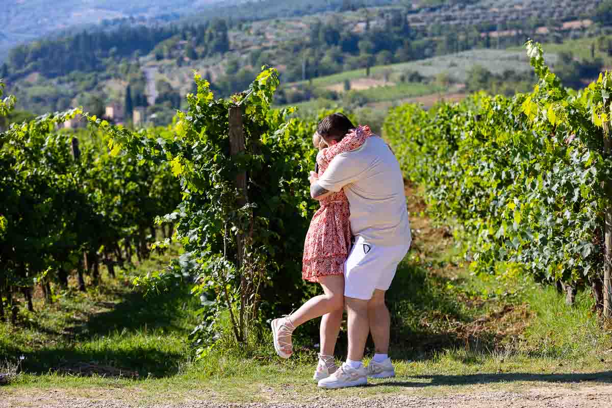 Greve in Chianti Proposal. The she said yes moment in front of a tuscan vineyard 