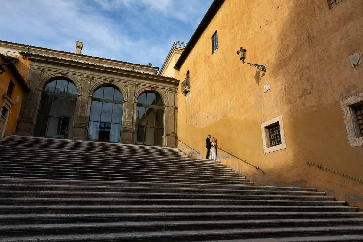 Artistic wedding photography of a wedding couple taking pictures in Rome 