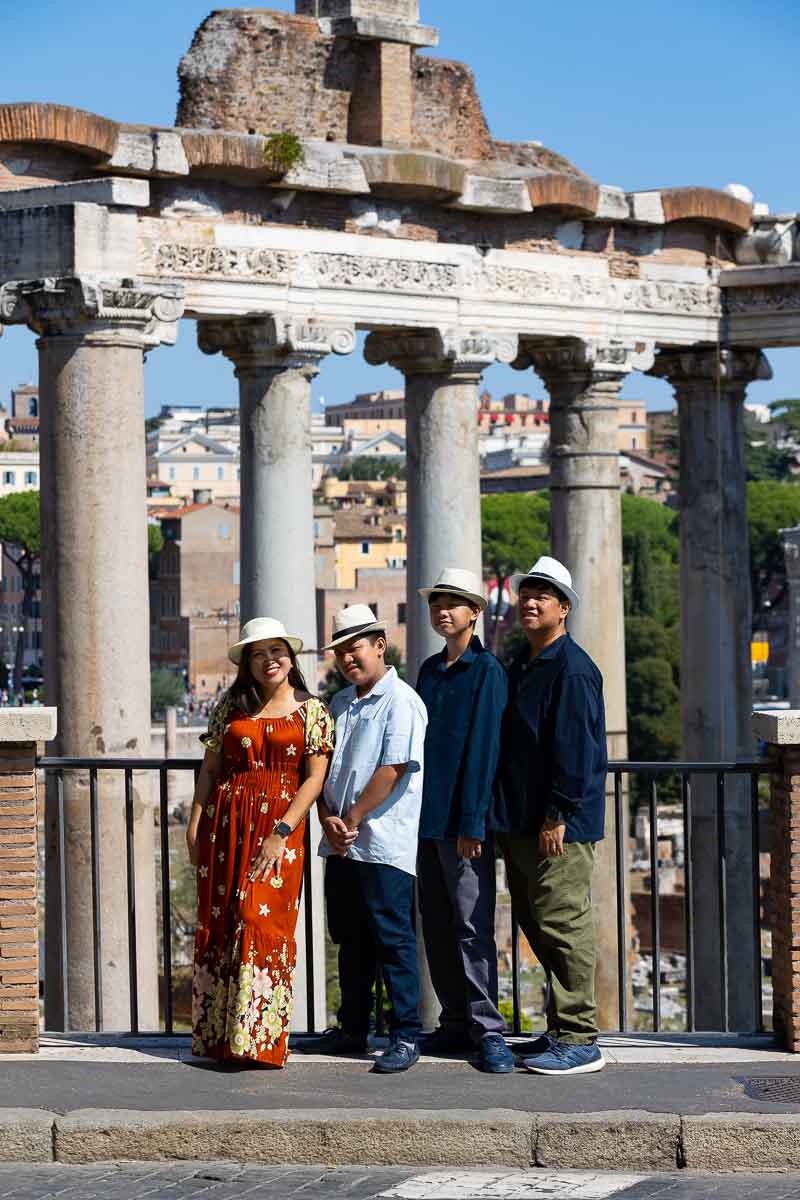 Vertical image of a family photo shoot taken in Rome during a sightseeing vacation 