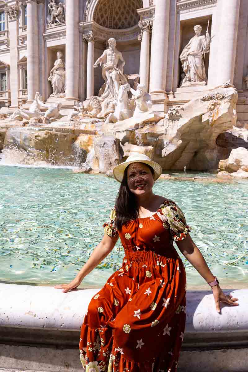 Mom solo portrait at the Trevi fountain in Rome