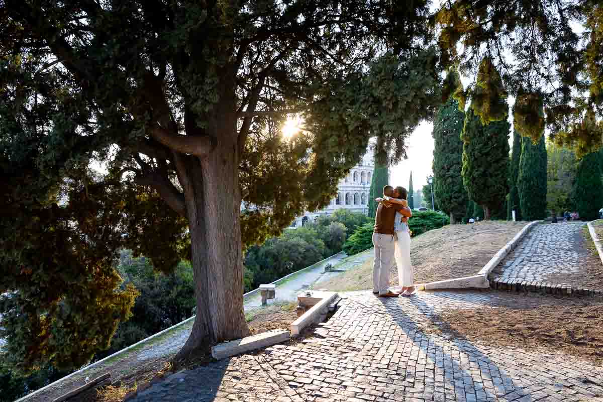 Picture of a couple just engaged in Rome Italy. Exclusive Proposal at the Colosseum 