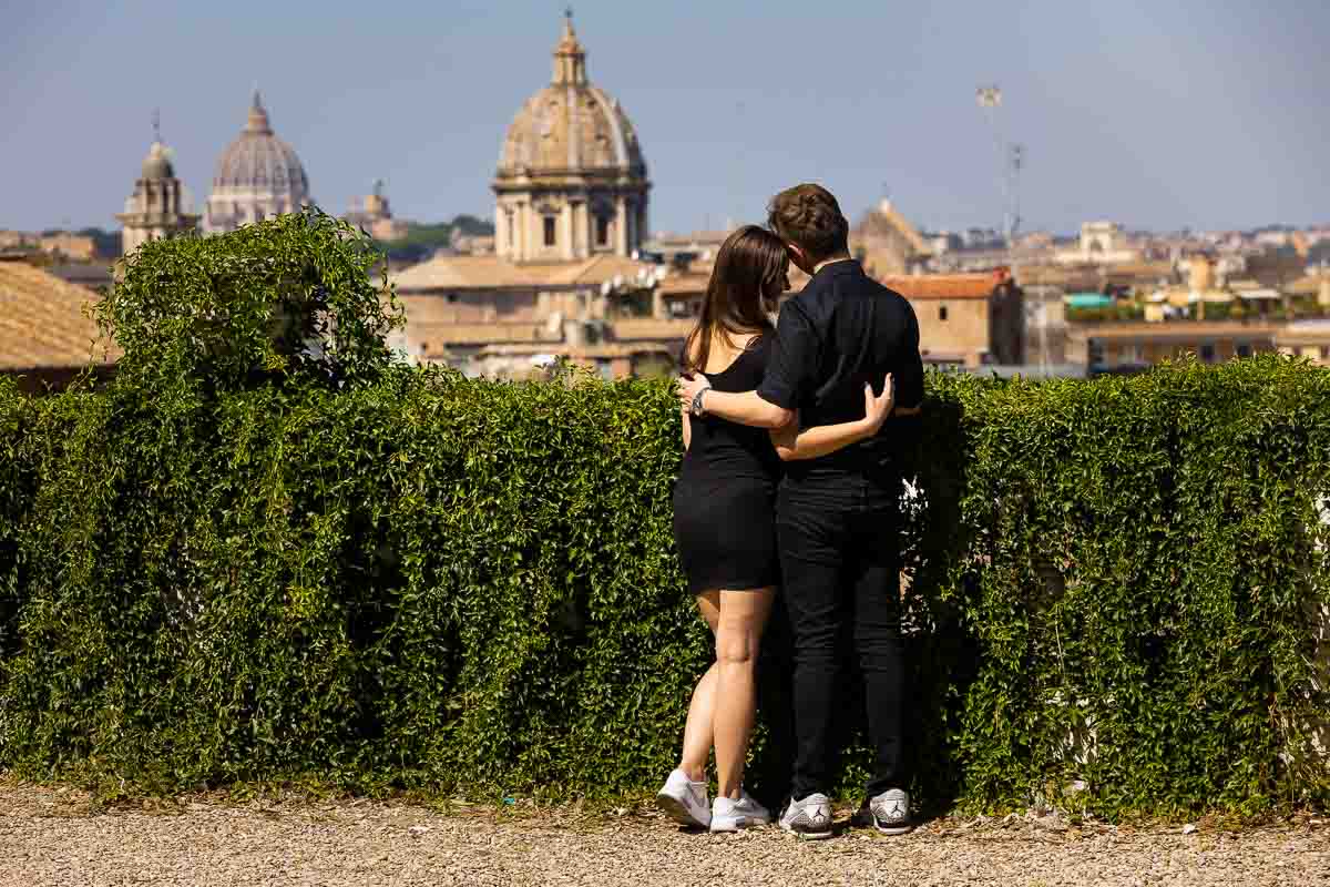 Admiring the Rome cityscape during a couple engagement photo shoot in Rome