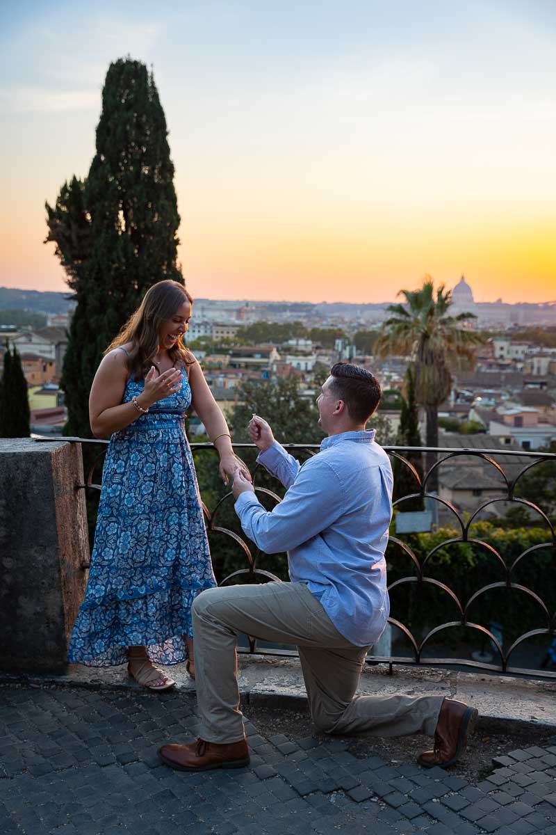 Proposing marriage with an engagement ring during sunset at the Pincio Terrace in Rome Italy. Pincio Sunset Proposal in Rome 
