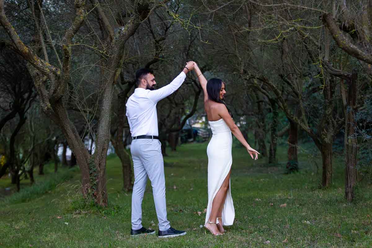 Taking pictures in the garden among greenery and trees 