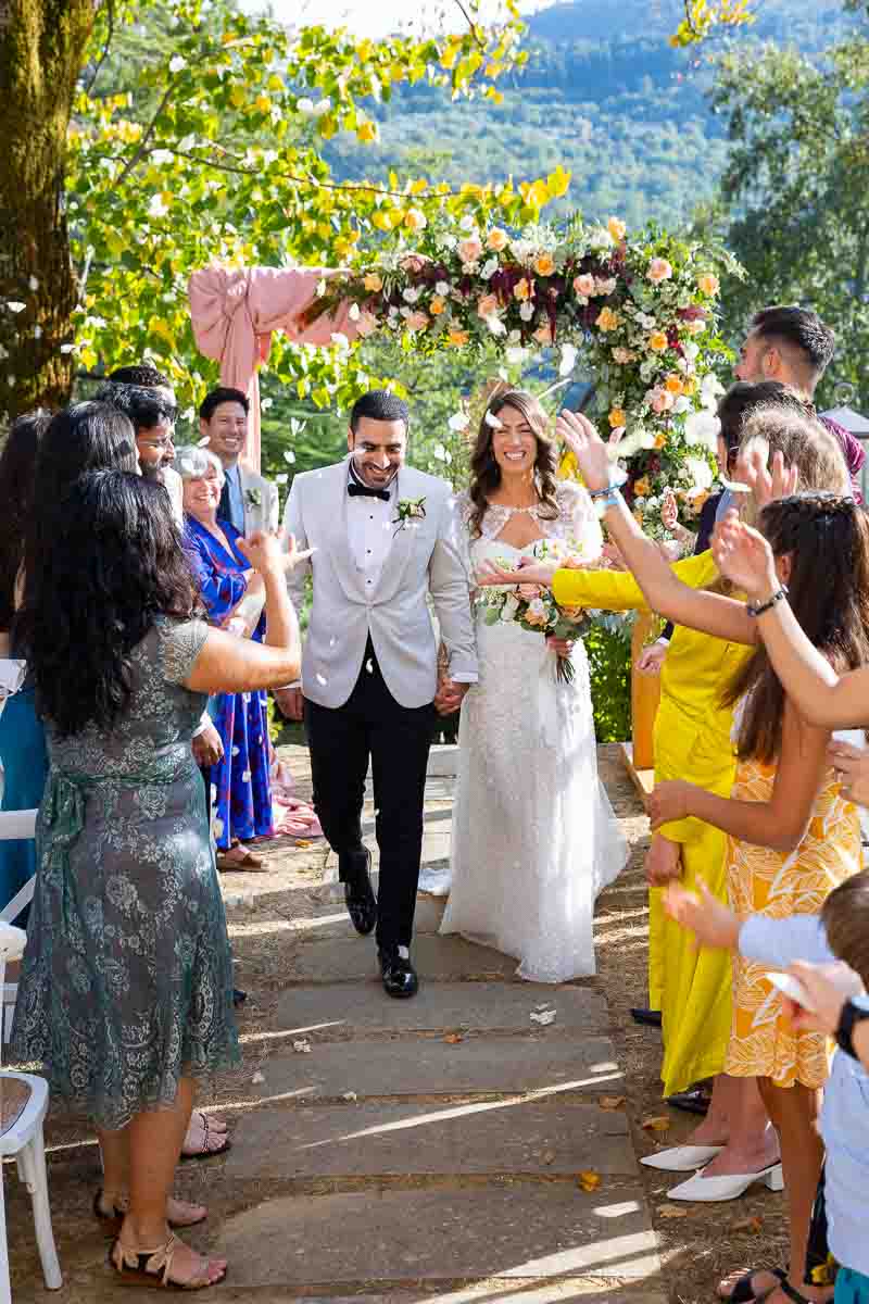 Bride and groom just married exit from the wedding ceremony