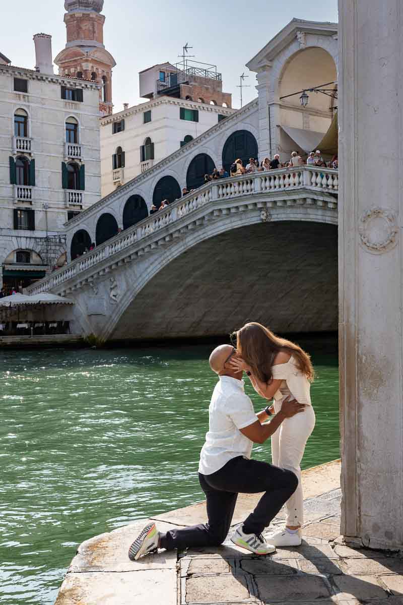 She said yes to a splendid wedding marriage proposal taking place in Venice at the Rialto bridge and photographed by a proposal photographer 