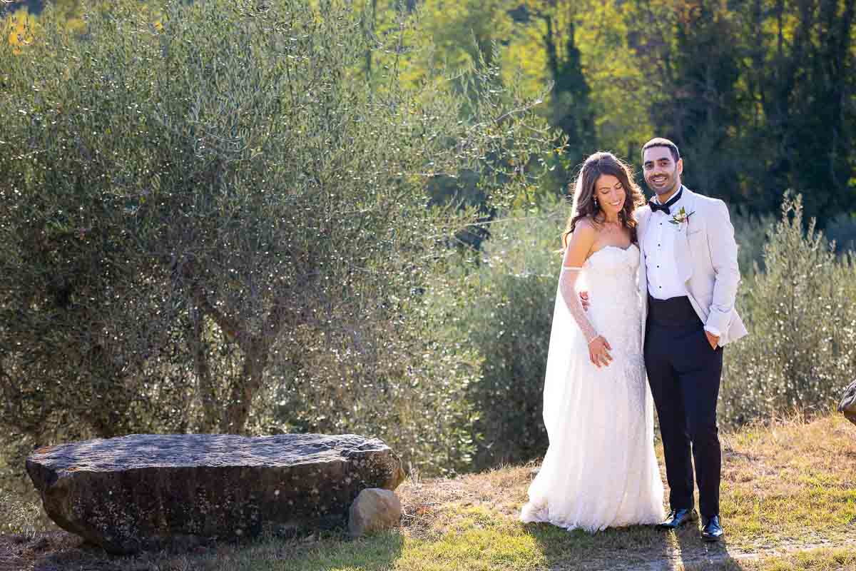 Newlyweds just married taking Tuscany wedding photography pictures. Wedding photography in Tuscany 