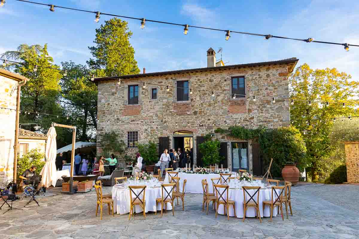 Picture of the wedding villa photographed outside from the courtyard wedding decorated with table set up for dinner and flowers and candles