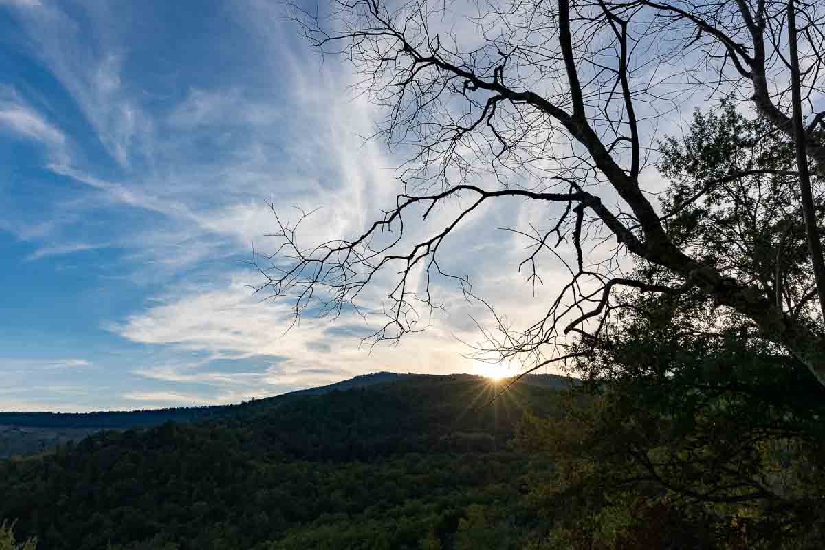 Sun setting over the tuscan mountains