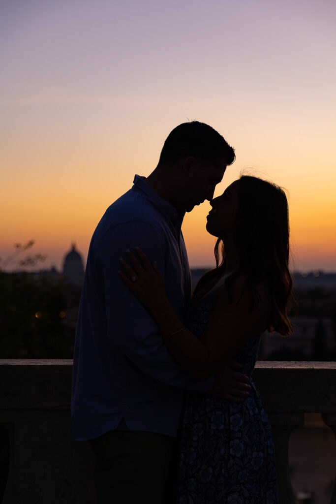 Silhouette image of couple in Love at sunset in Rome