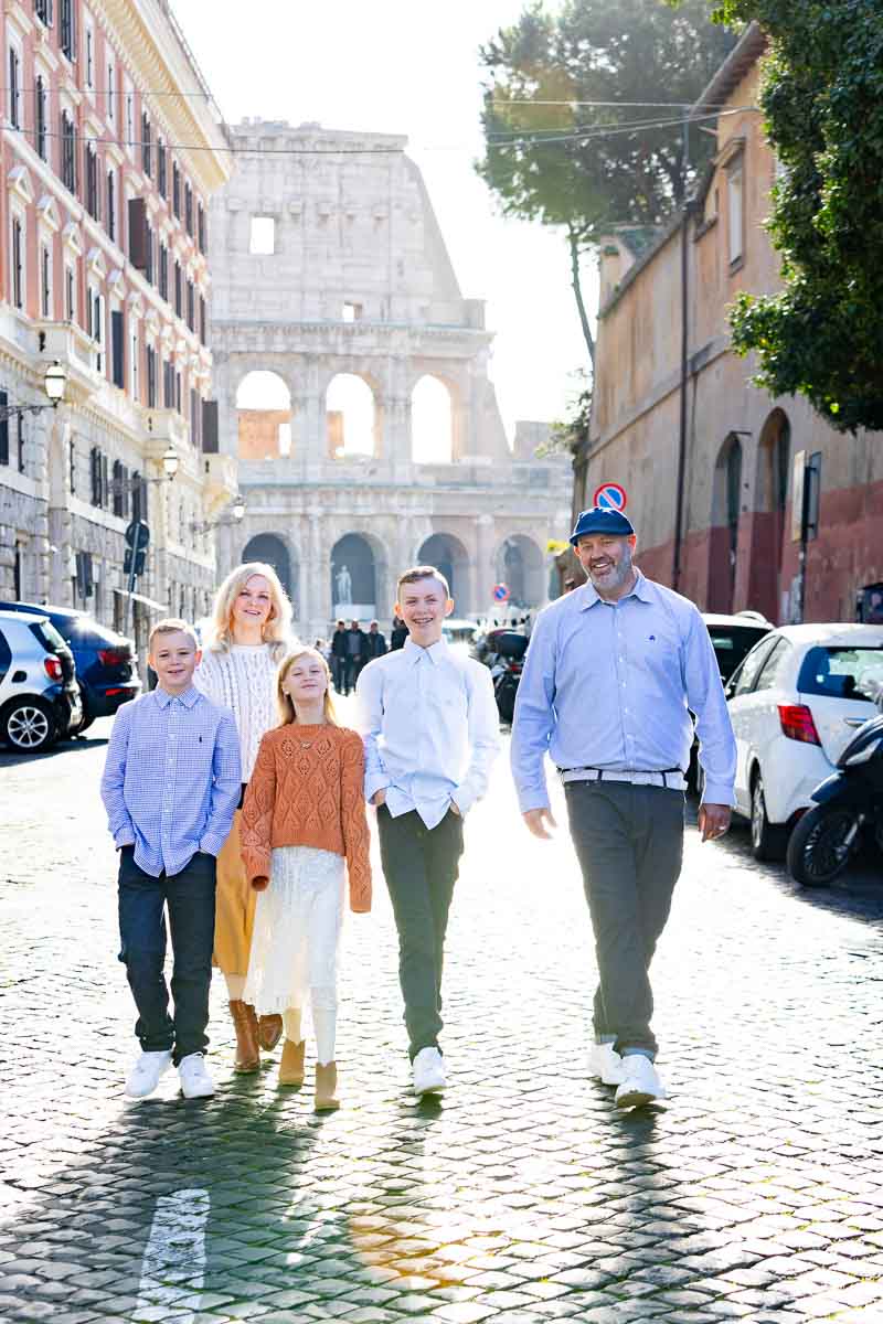 Walking in Rome. Family photo session on a street walk around the Coliseum 