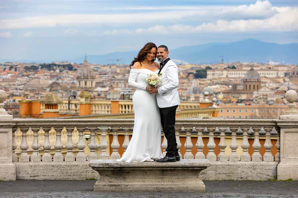 Standing on a marble bench photographed in front of the amazing skyline view of the Eternal city