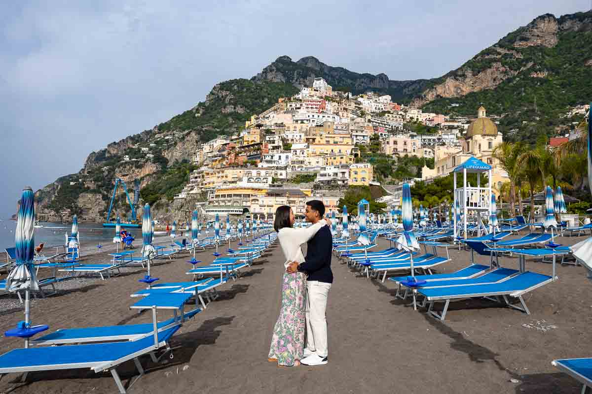 Marina grande photo of a newly engaged couple taking pictures on the beach 