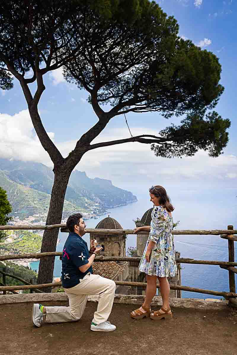 Wedding Marriage proposal in Ravello Italy photographed during the moment in which he goes down on one knee to ask the big question 