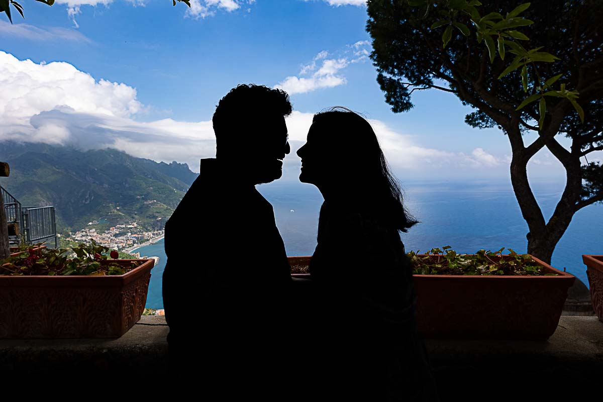 Silhouette image of a couple in love after proposing marriage 