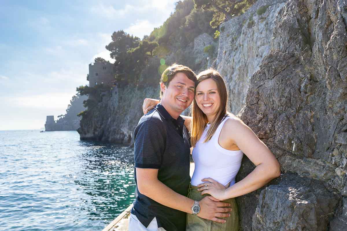 Couple portrait by the sea in Positano during and engagement photoshoot in Italy by the Amalfi coast 
