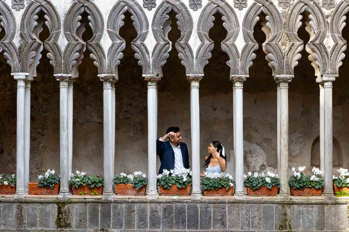 Villa Ruffolo's engagement photos in between columns