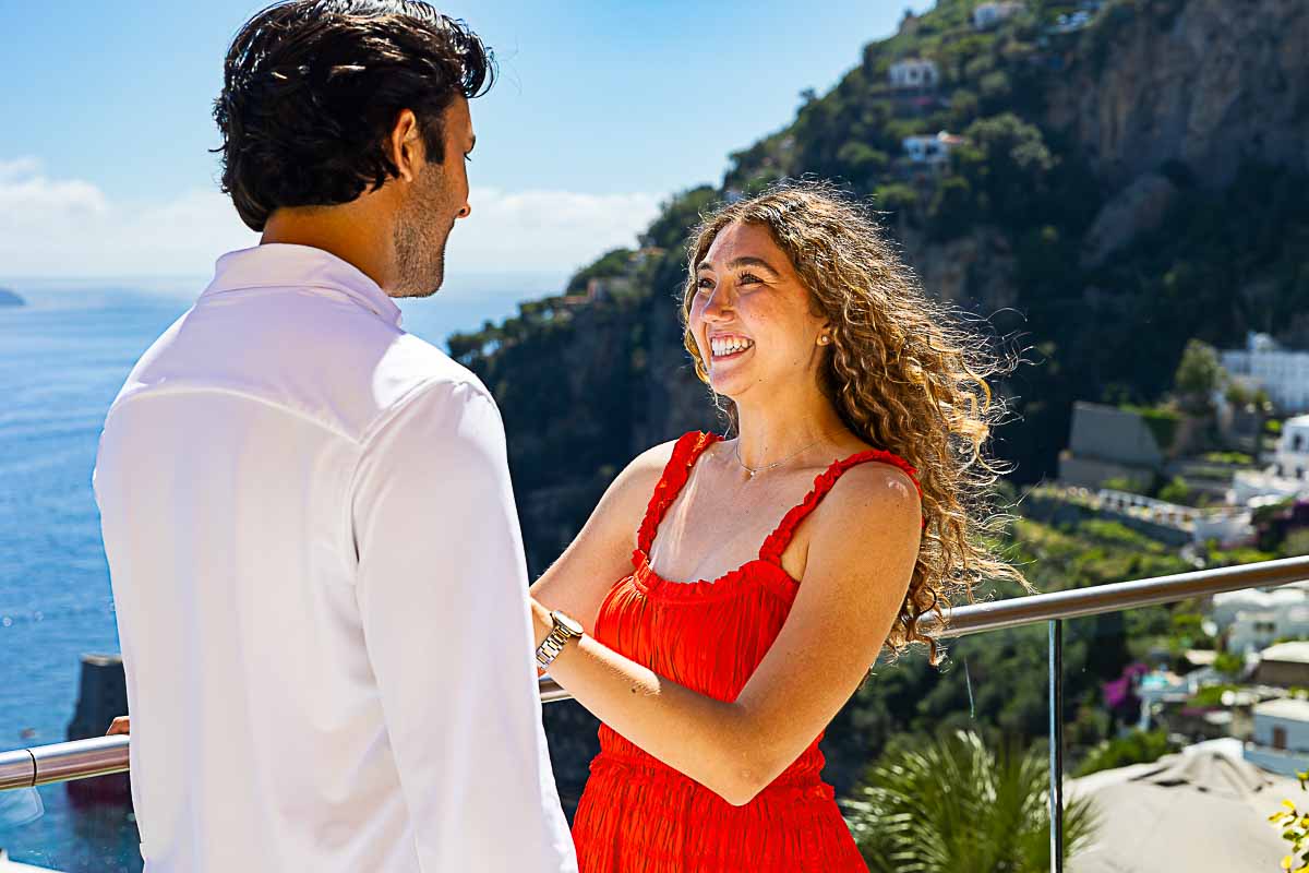 Close-up of her smiling joyfully, captured during an intimate engagement photo session