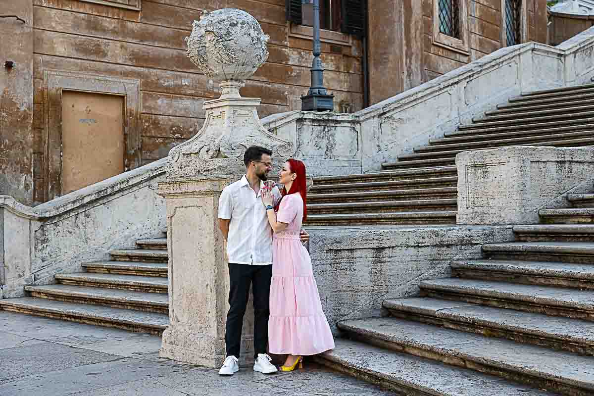 Elegant photo of couple posing on the Spanish Steps during a romantic Sunrise Photoshoot in Rome
