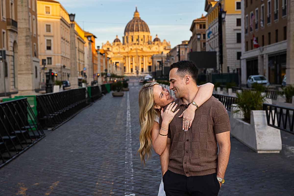 Couple nice smooth light early portrait with Saint Peter's dome in the far distance. Sunrise Proposal at Castel Sant’Angelo 