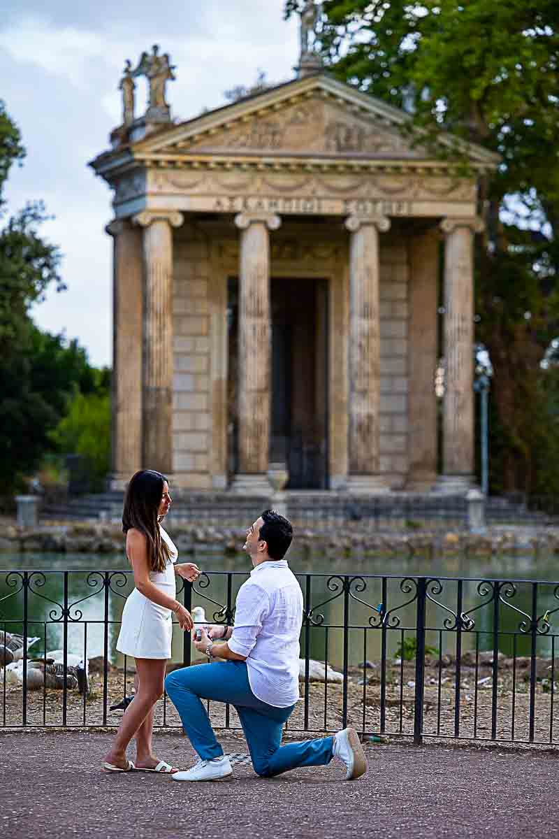 Villa Borghese Sunrise Proposal in Rome Italy. Image of the knee down moment f proposing 