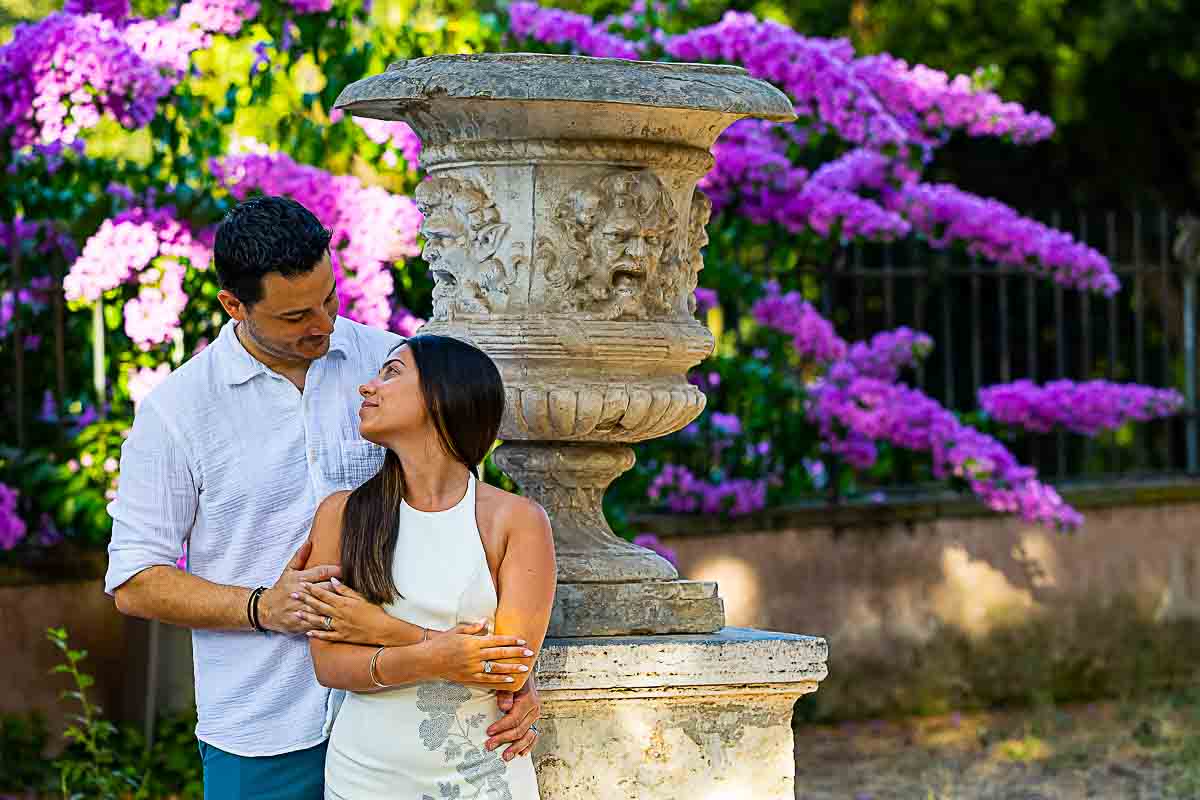 Close up imagery of a couple in front of an old roman vase in Villa Borghese Sunrise Proposal in Rome