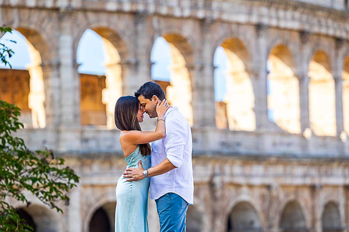 Bust upward photography shot sideways standing in pose before the Coliseum in Rome Italy