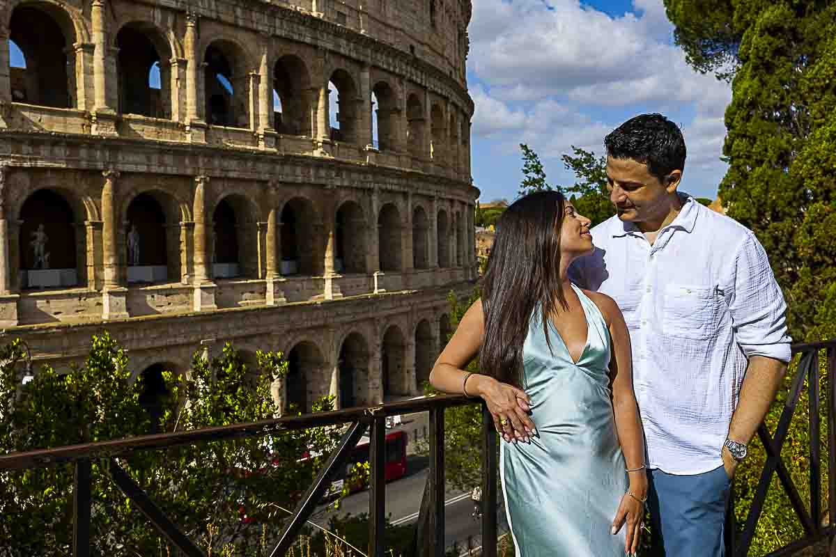 Standing next to the Coliseum while on a Rome photoshoot session in the Eternal city of Roma