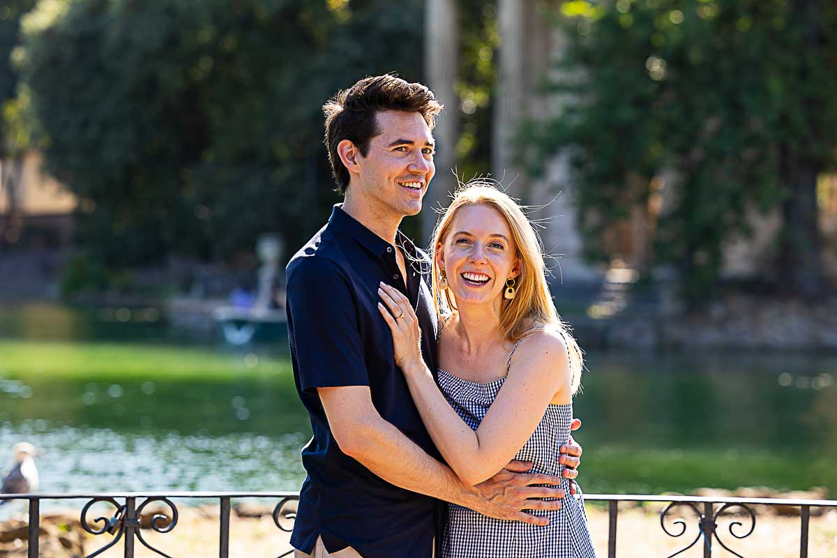 Close up photography of a couple posing in front of the roman lake during their photoshoot 