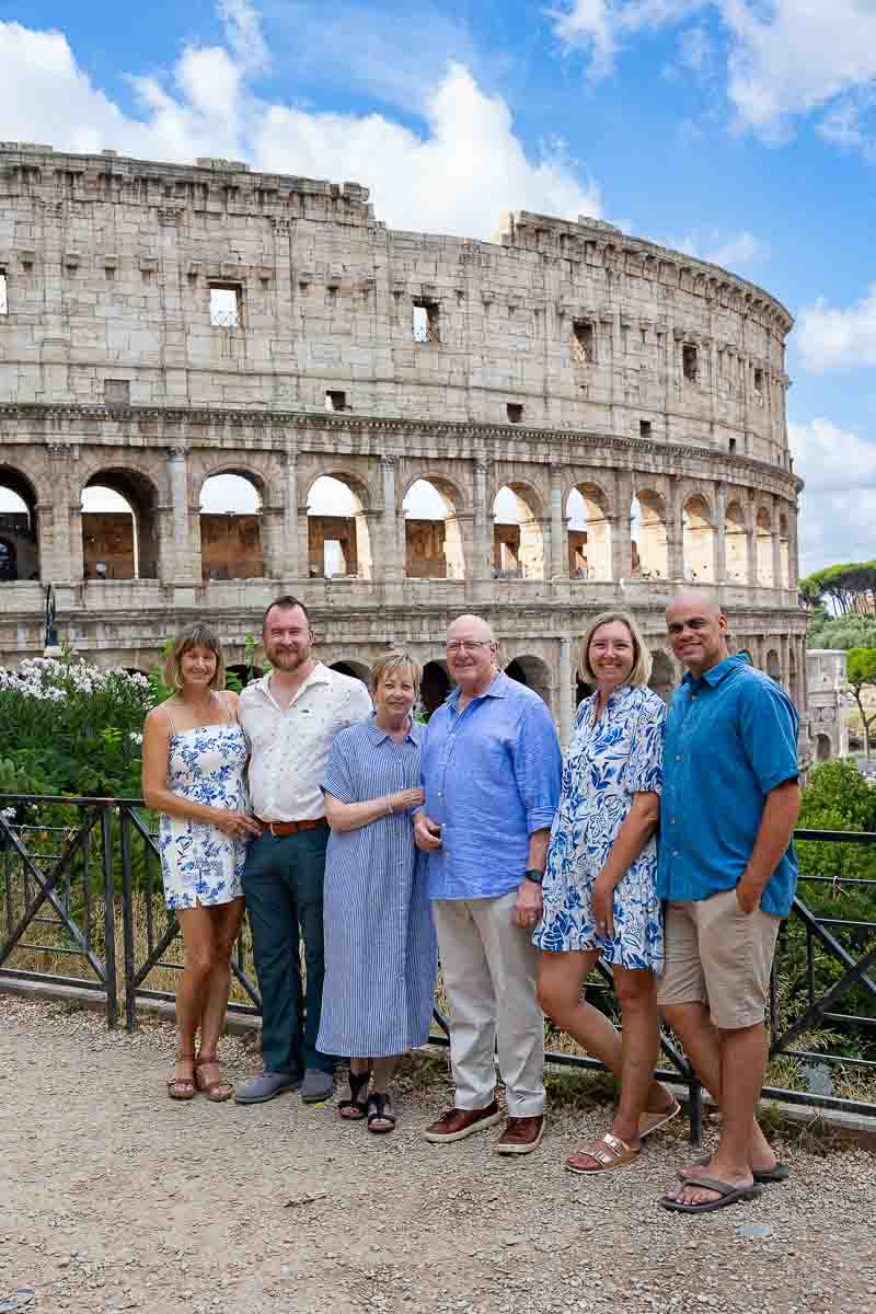 Posing in front of the Coliseum during a photo shoot session in the Eternal city in Italy
