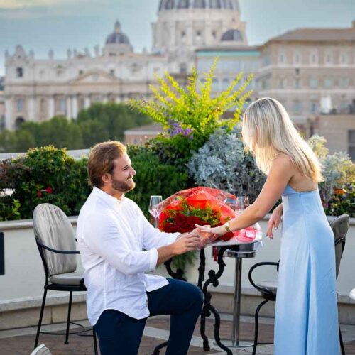 Picture of the knee down moment during the private terrace proposal in Rome Italy